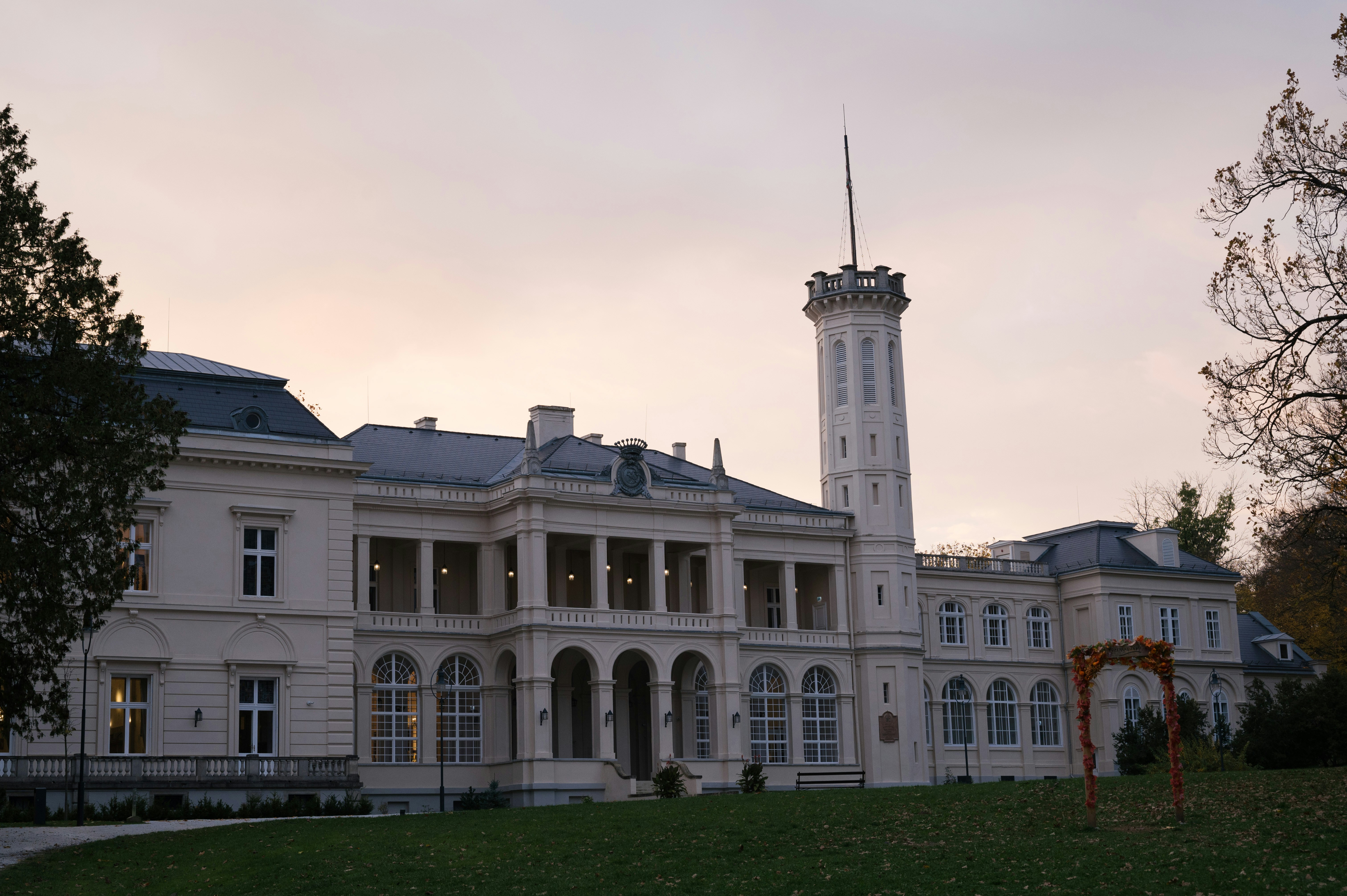 A large white building with a clock tower