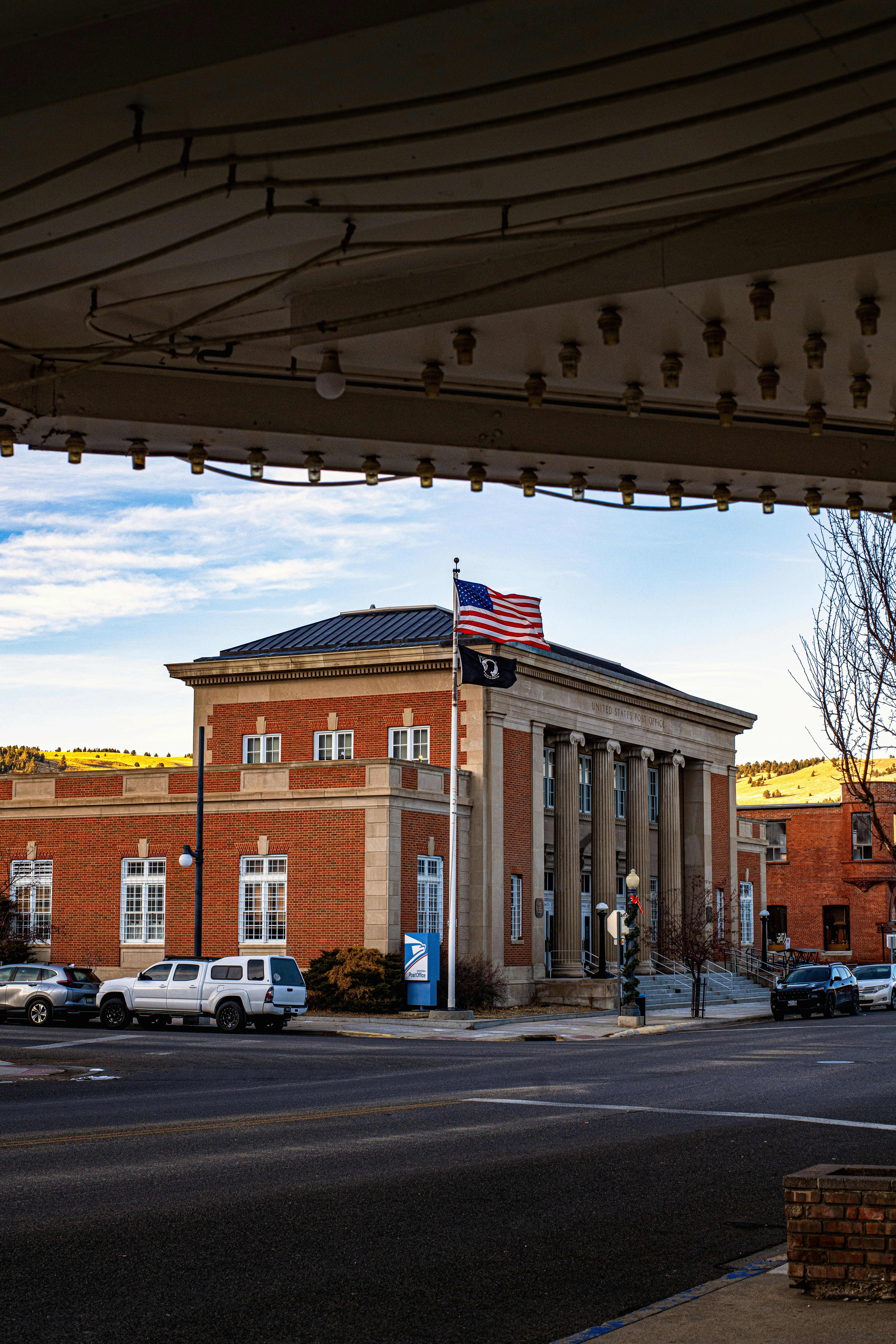 A large building with a flag on top of it