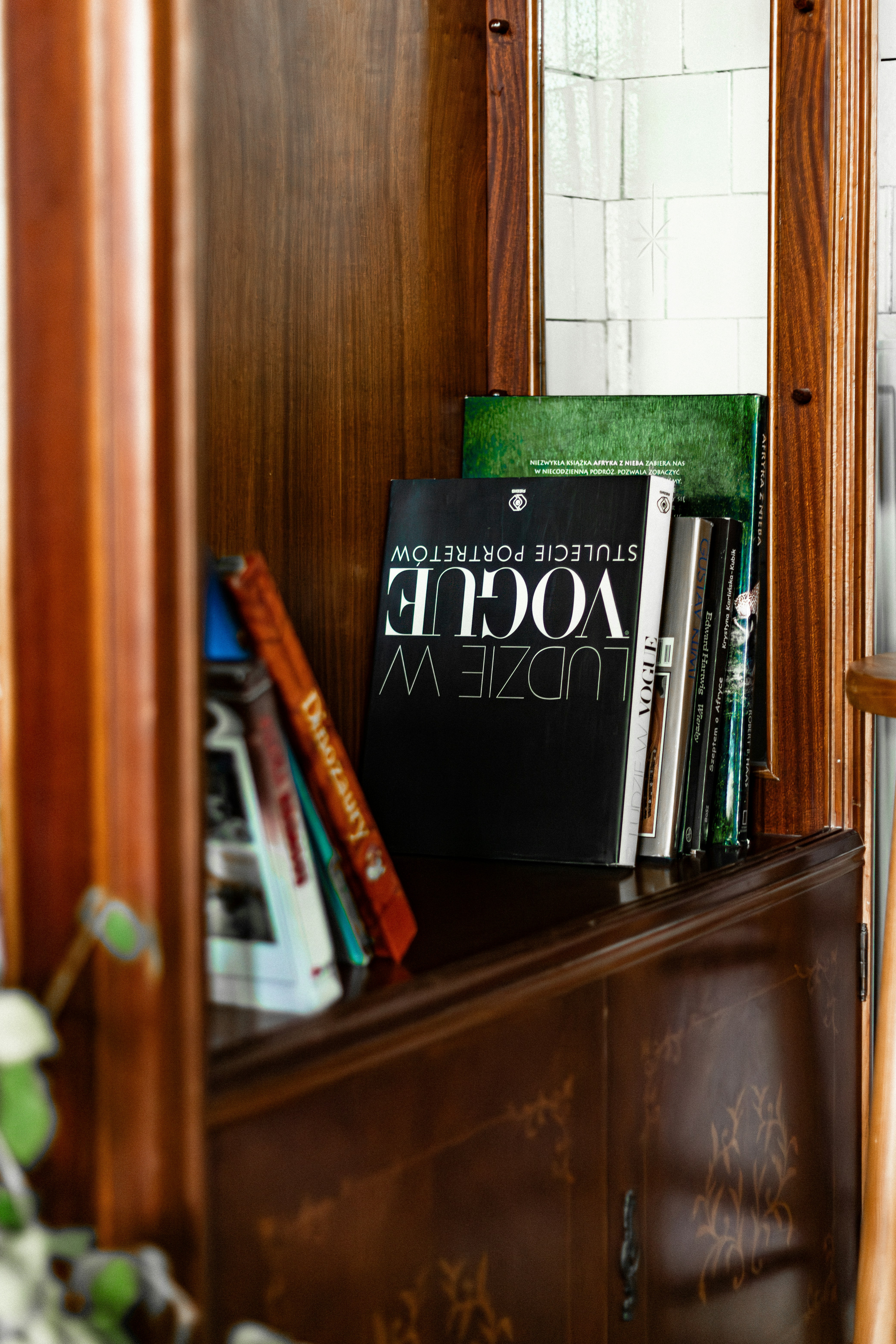A bookshelf with a book on top of it