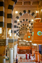 The interior of a large building with a clock on the wall