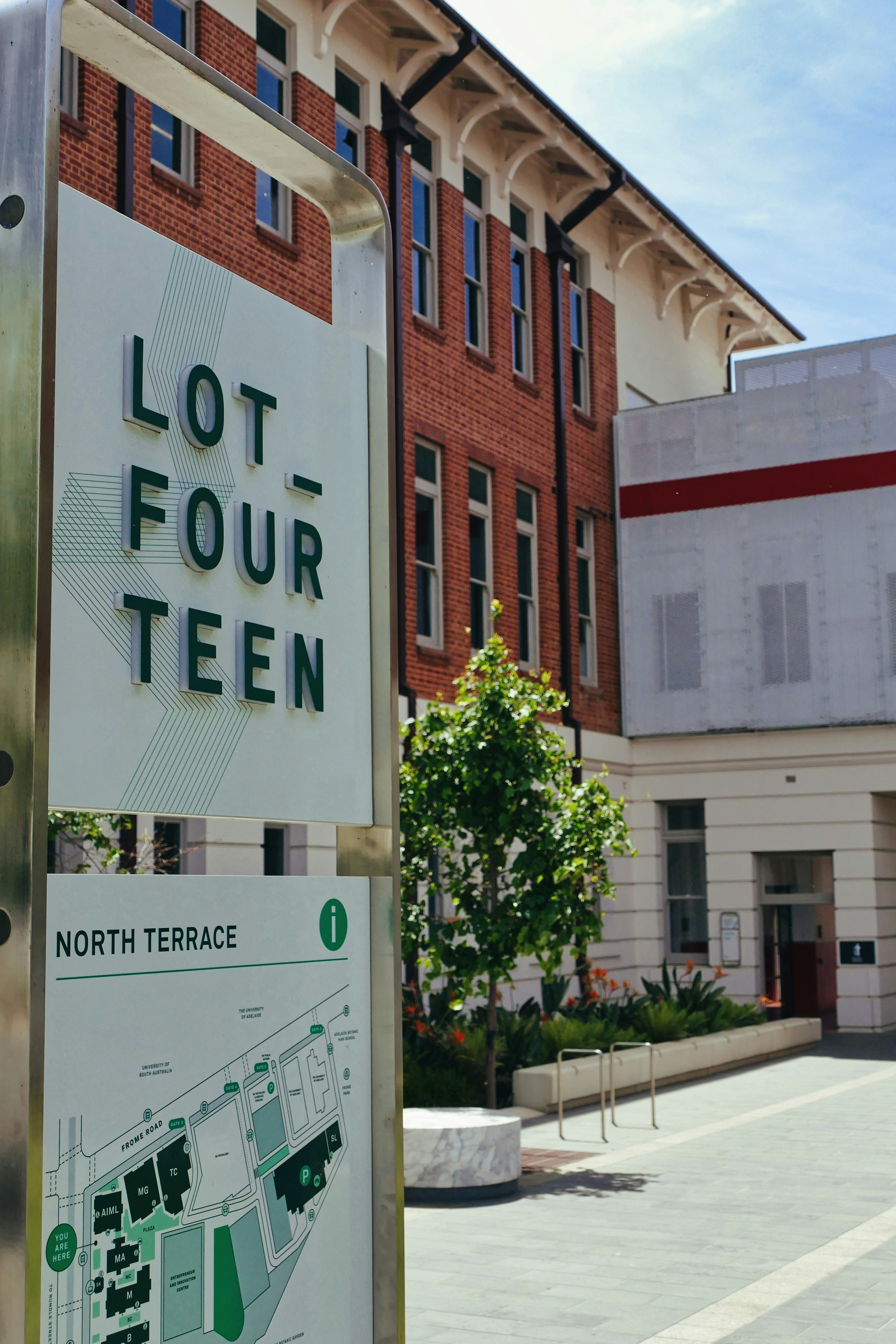 A lot four ten sign in front of a building
