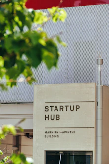 A building with a sign that says start up hub