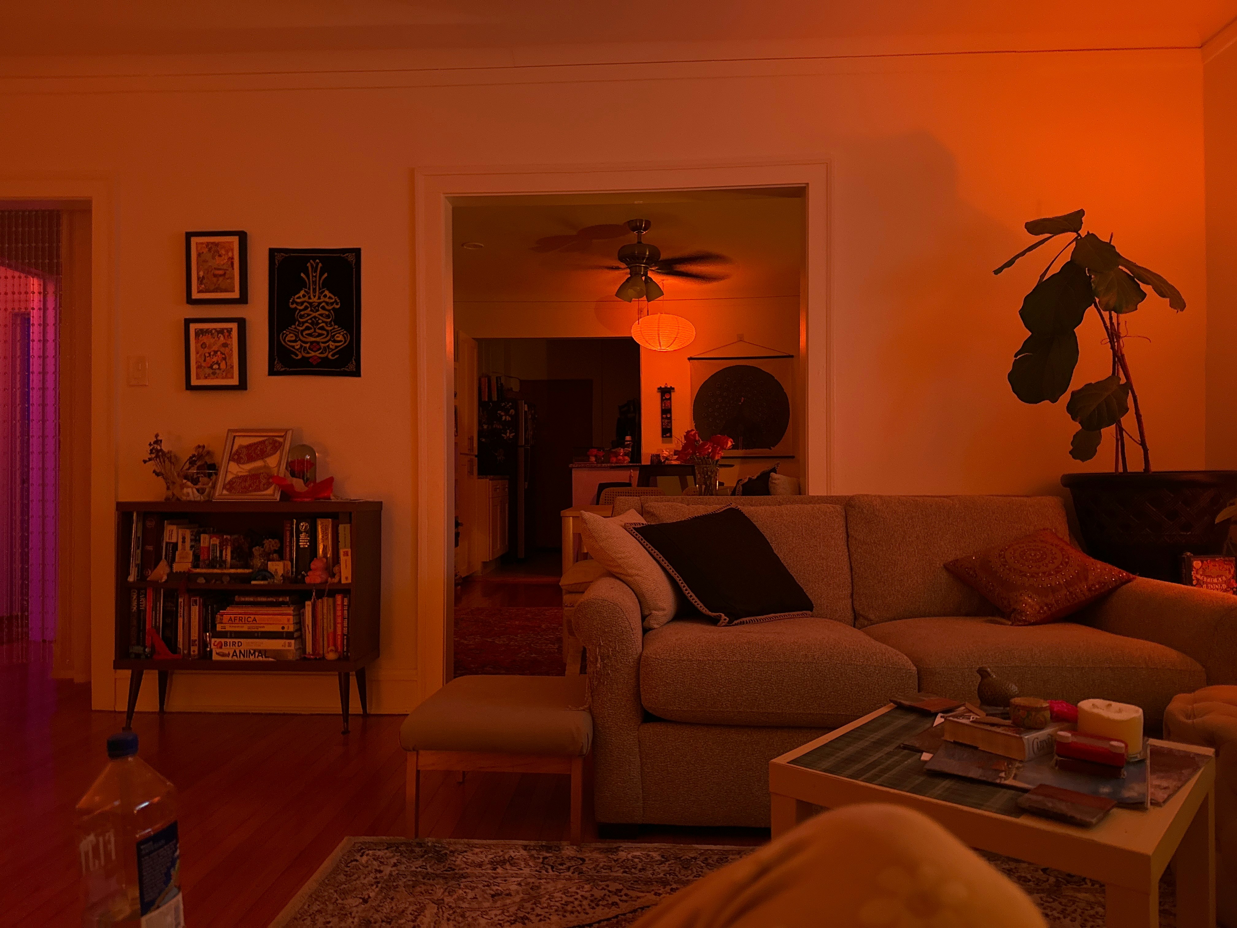 A living room filled with furniture and a fire place