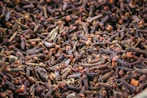 A close up of a mixture of brown beans