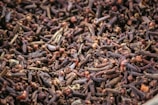 A close up of a mixture of brown beans