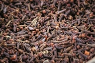 A close up of a mixture of brown beans