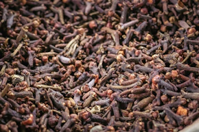 A close up of a mixture of brown beans