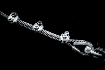 A group of metal objects on a black background