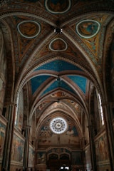 A church with a large ceiling and painted walls