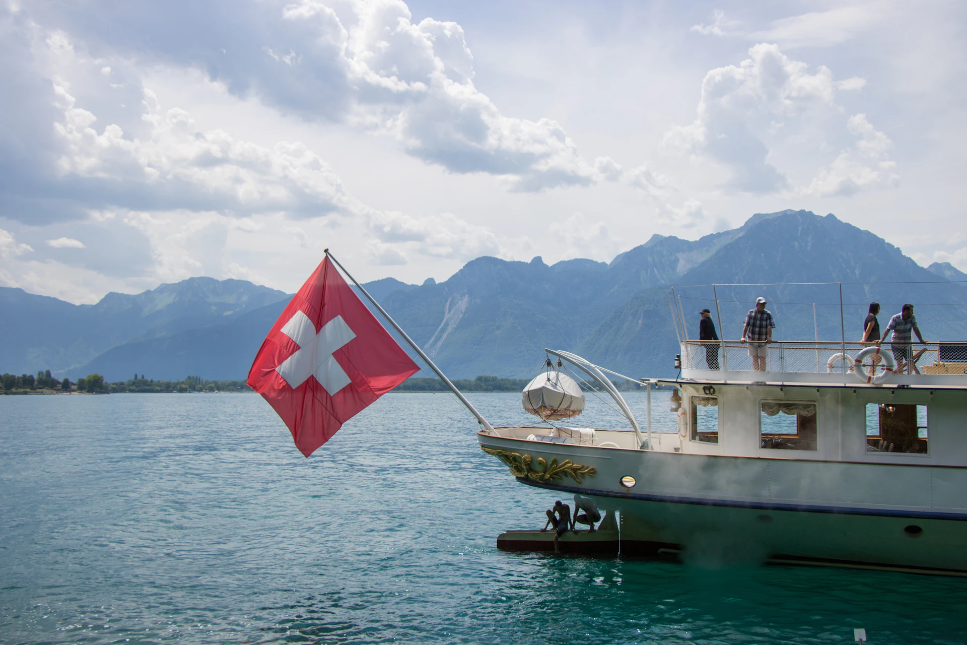 A boat with people on it in the water