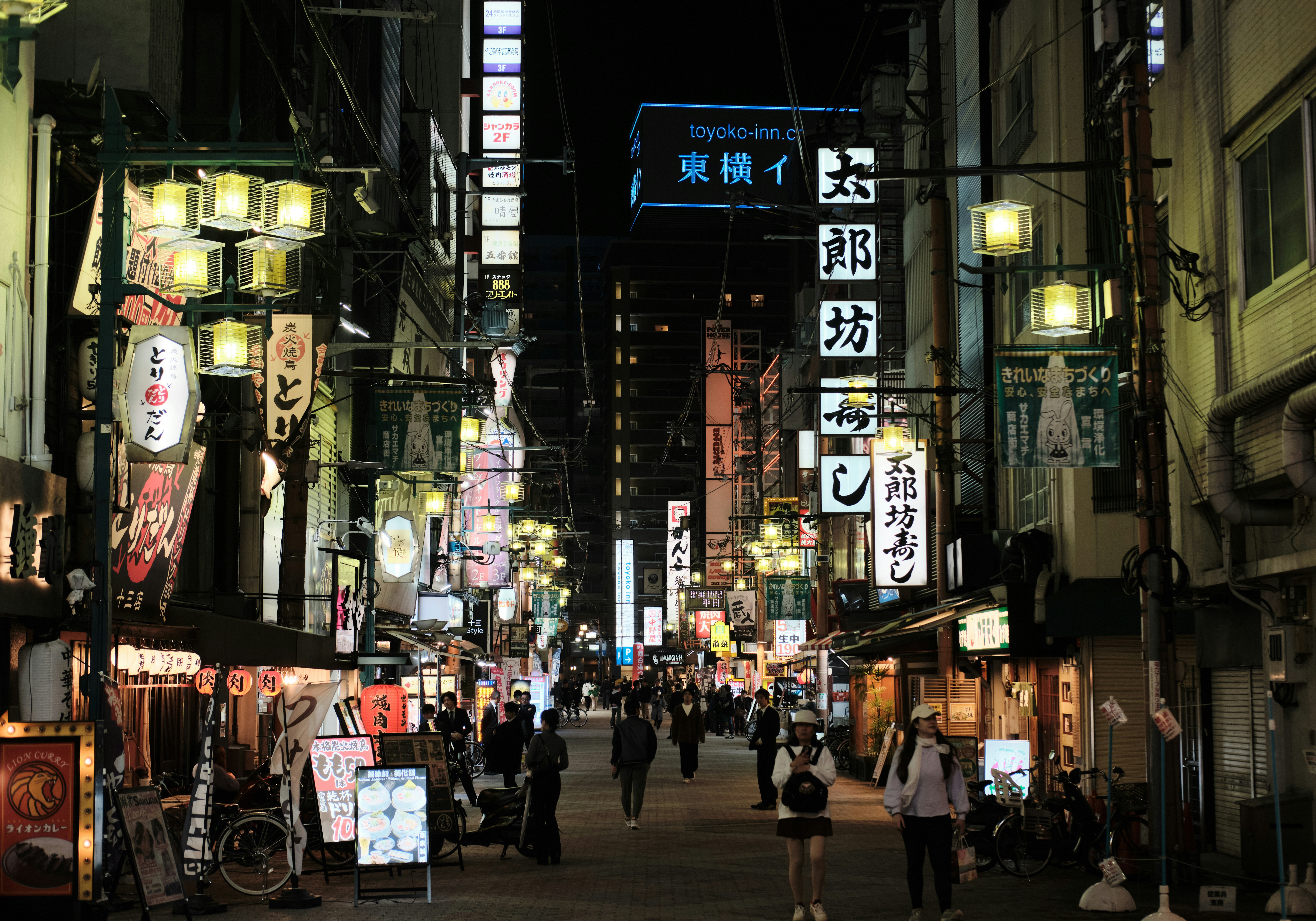 International guests enjoy nightlife in Neo Yokocho