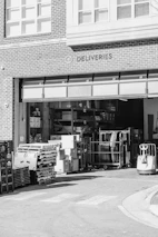 A black and white photo of a store front