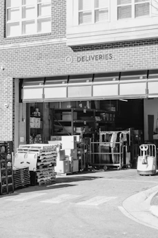A black and white photo of a store front