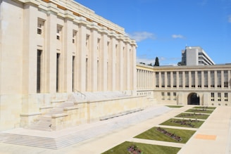 A large building with a lawn in front of it