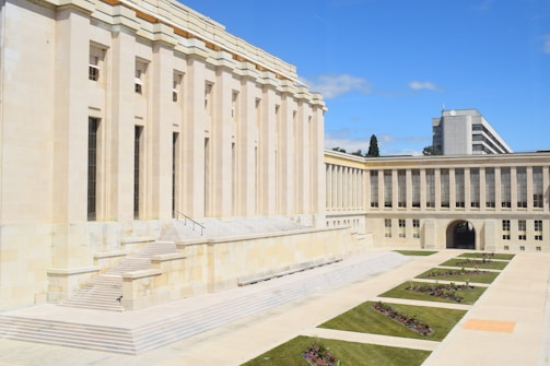 A large building with a lawn in front of it