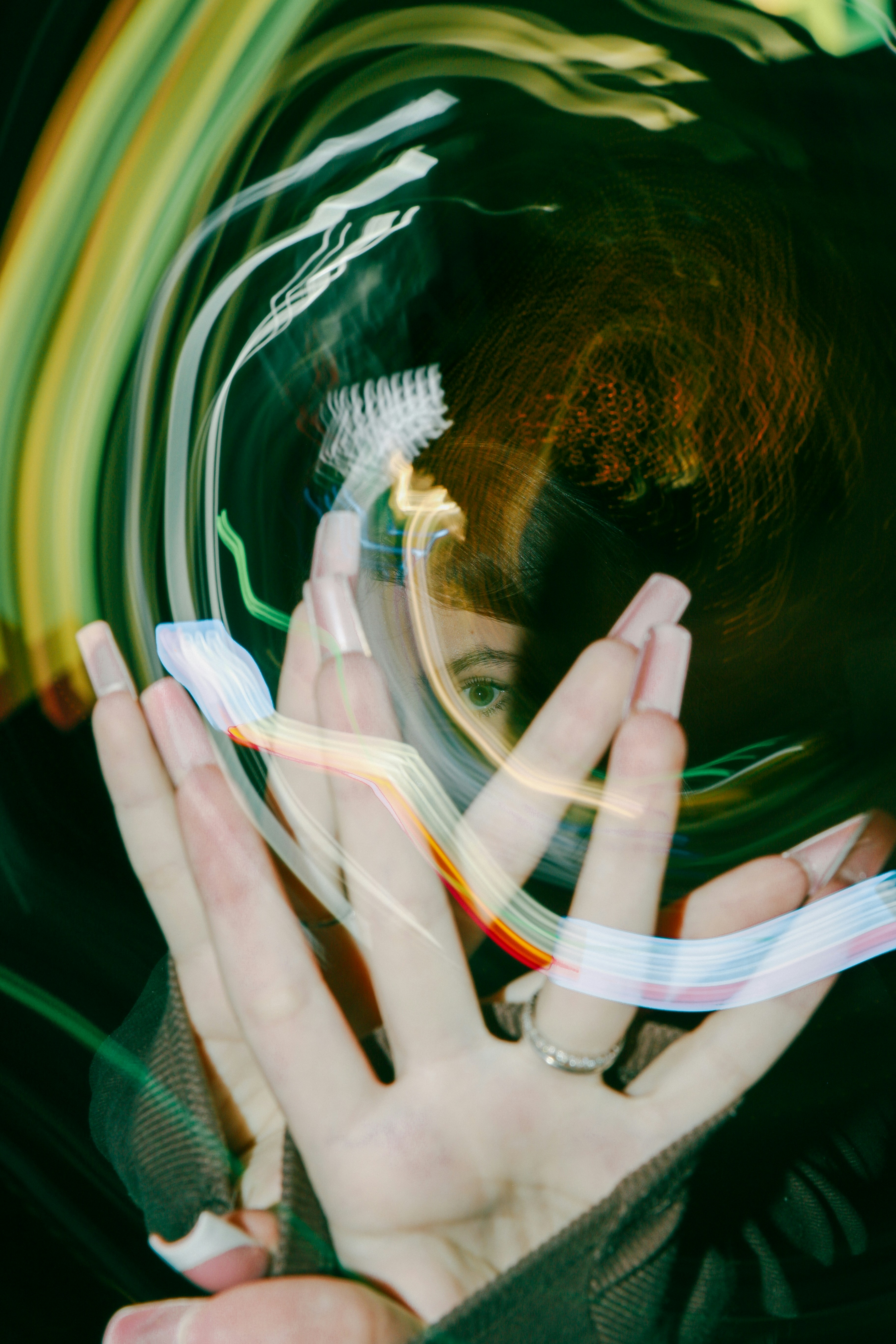 A woman with her hands on her face