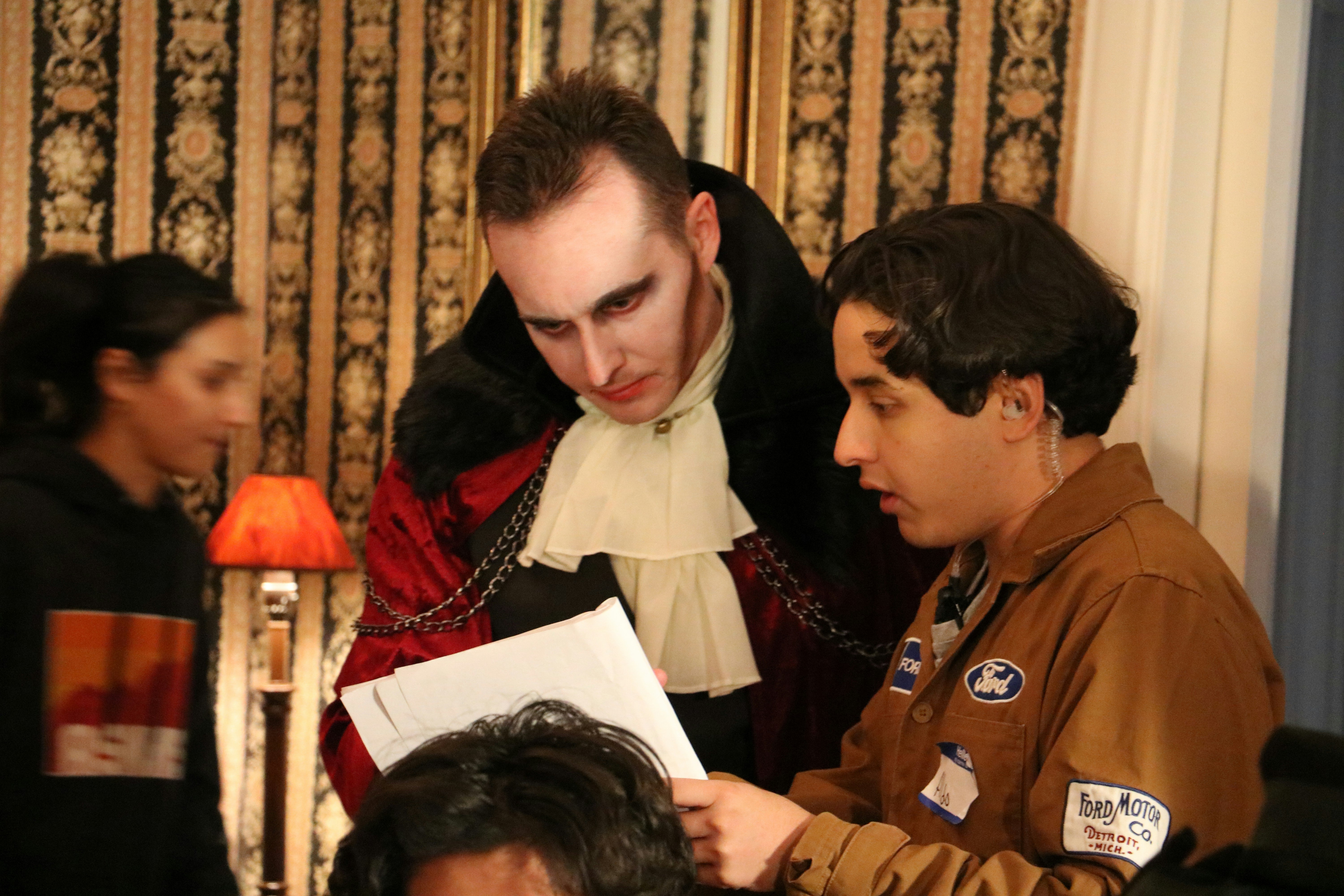 Moment capturing new member signing up with welcoming committee and club representatives - sports club