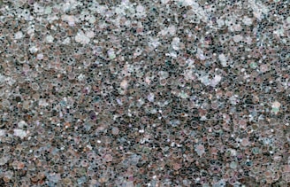 A close up of a black and white speckled surface