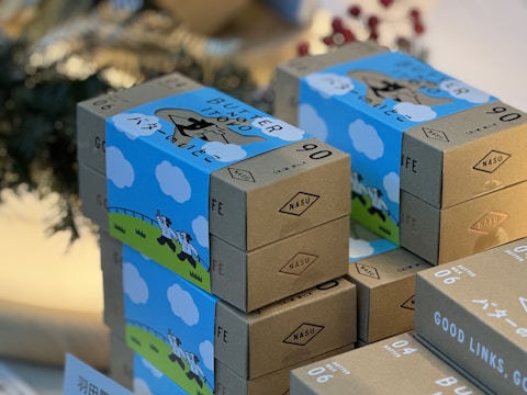 A pile of boxes sitting on top of a table
