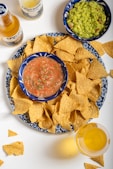 plate of corn chips and salsa - corn chip day - January 29