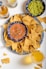plate of corn chips and salsa - corn chip day - January 29
