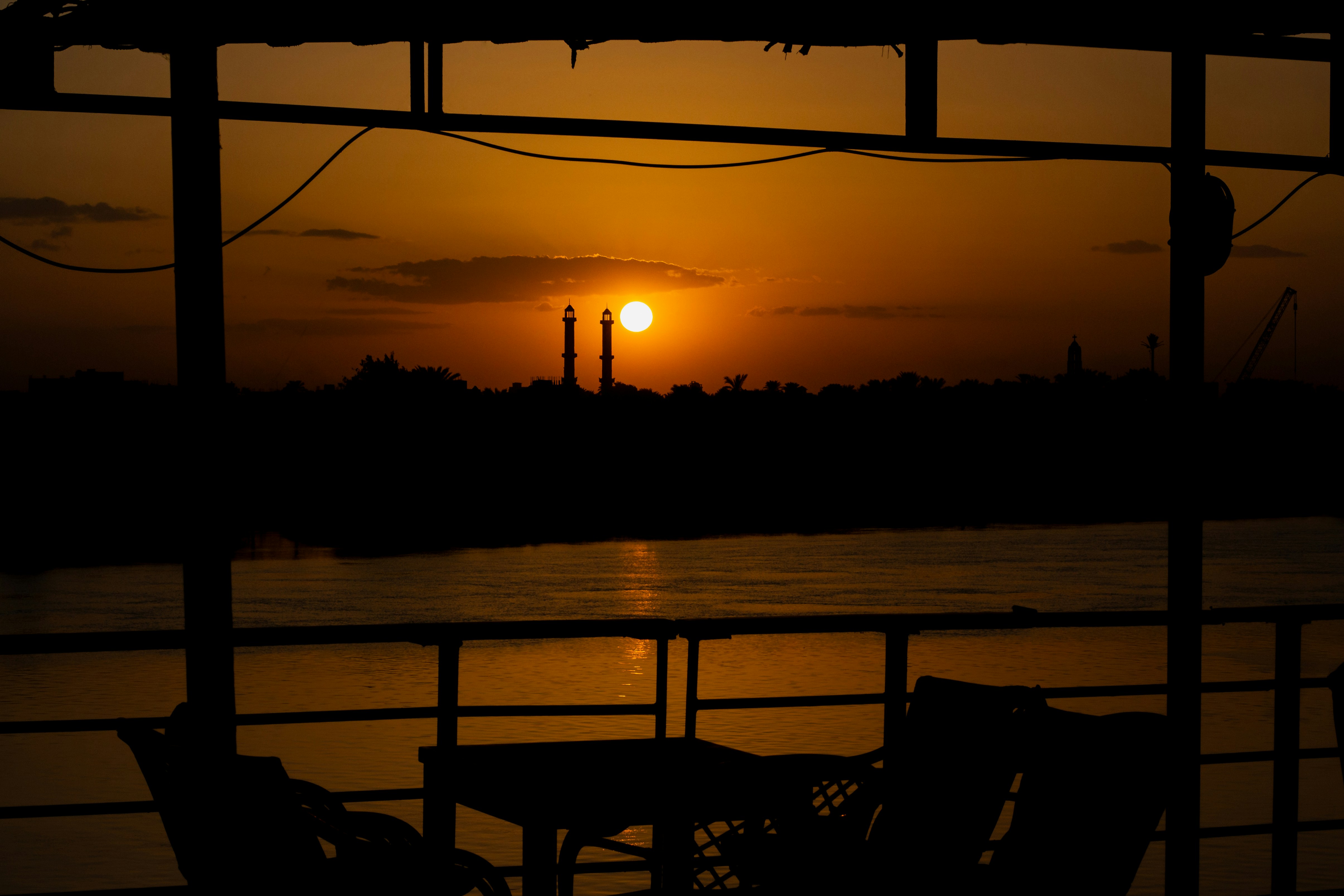 The sun is setting over a body of water