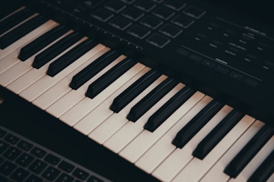 A close up of a keyboard and a keyboard mouse