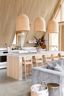 A living room with a couch a table and chairs