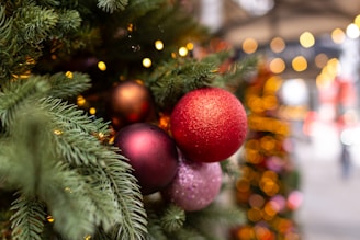 A close up of a christmas tree with ornaments