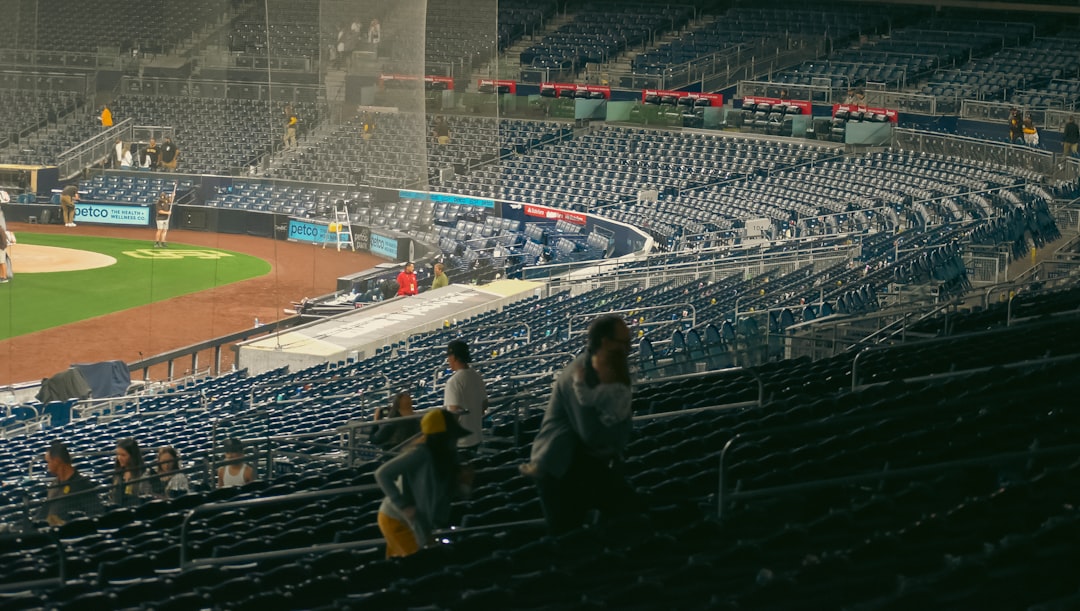 A baseball stadium filled with lots of empty seats,