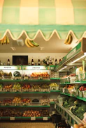 A grocery store filled with lots of fruits and vegetables
