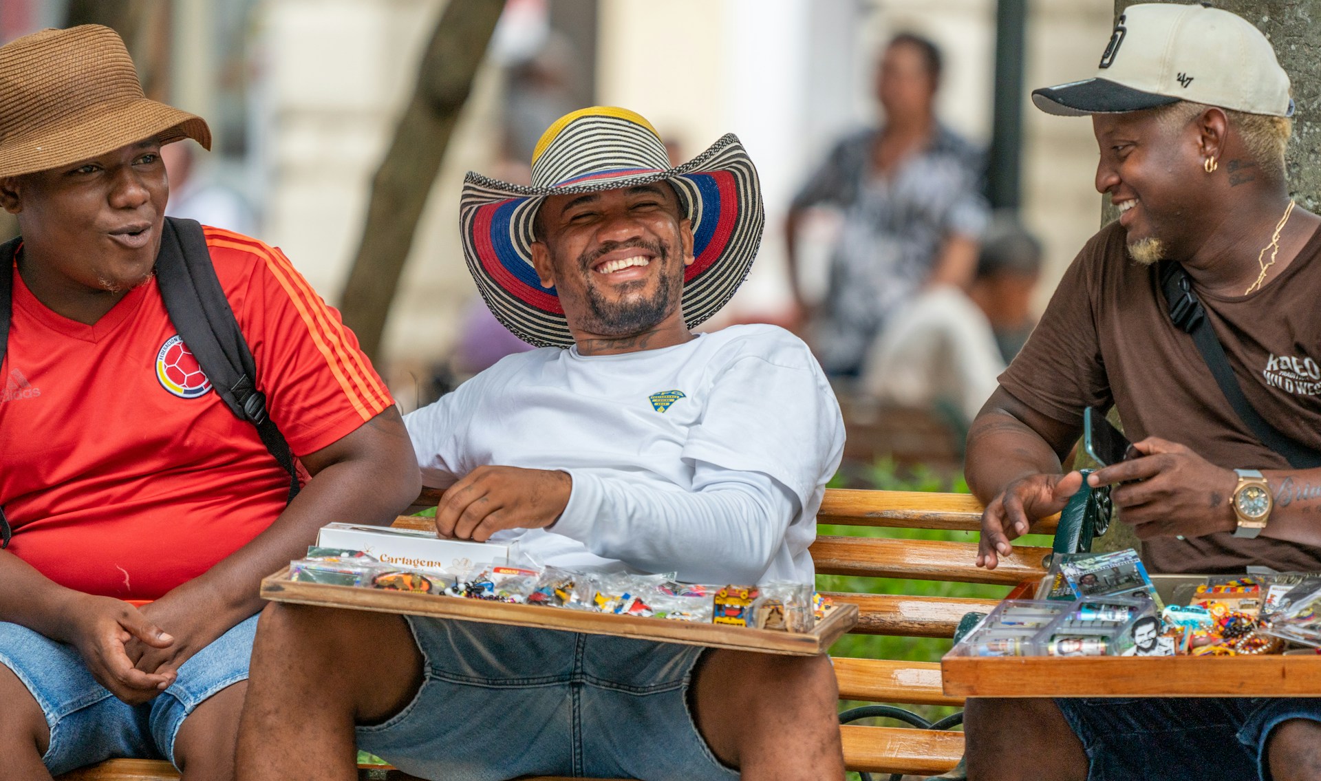 A group of men sitting around a wooden table