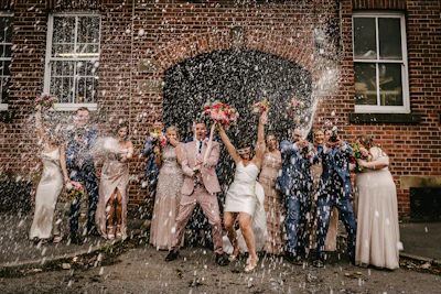 A group of people standing in front of a building