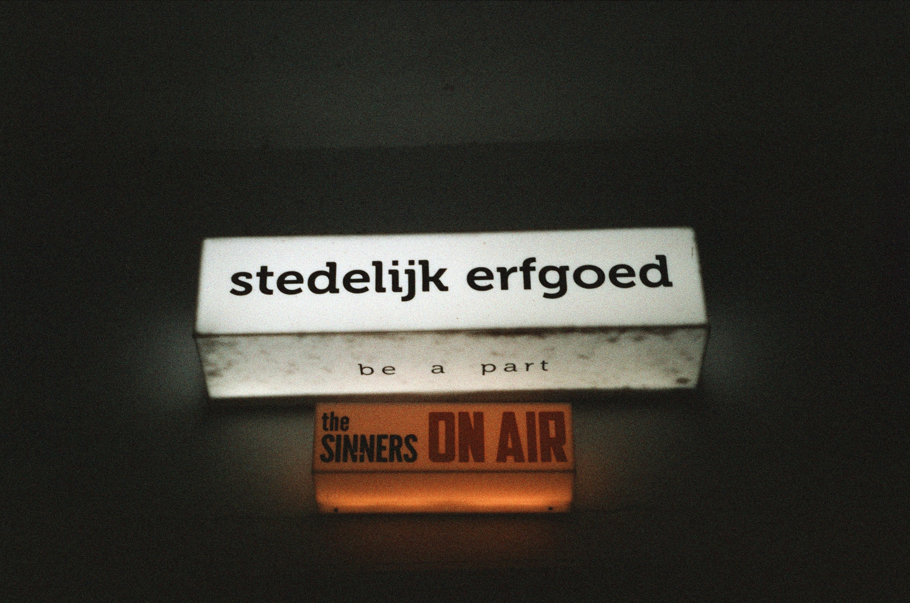 A close up of a sign on a wall