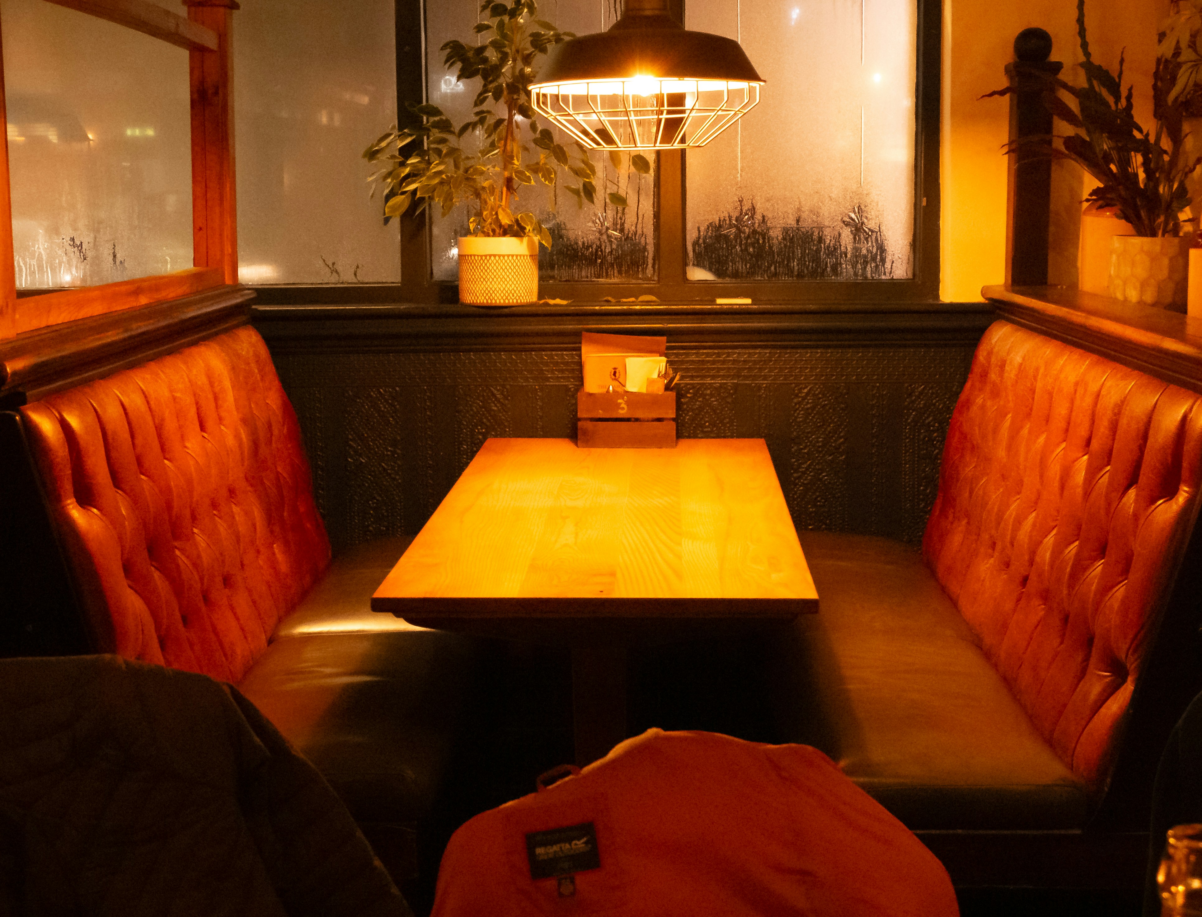 A table and some chairs in a room