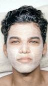 A man with a facial mask on his face