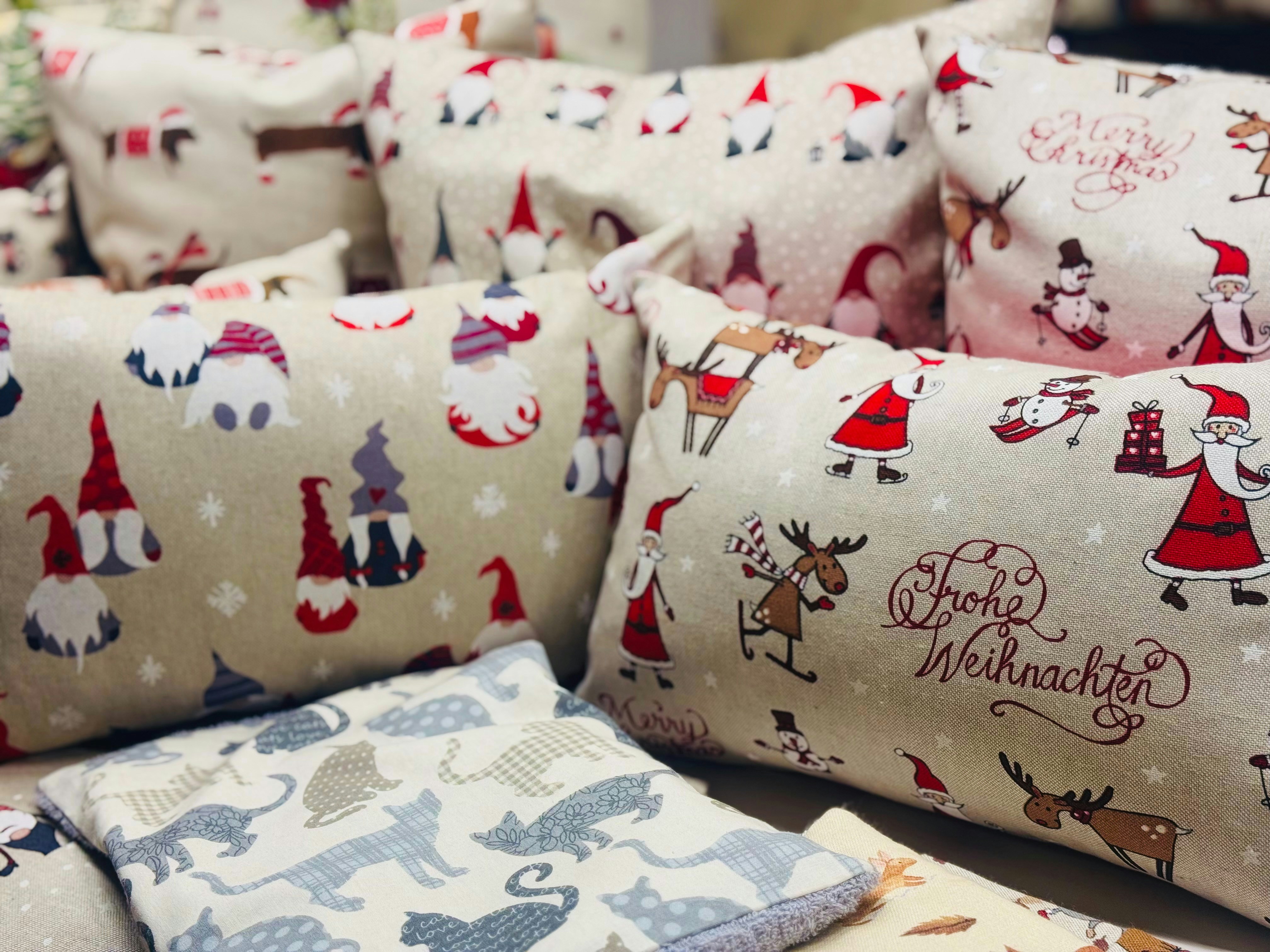 A bunch of pillows sitting on top of a table