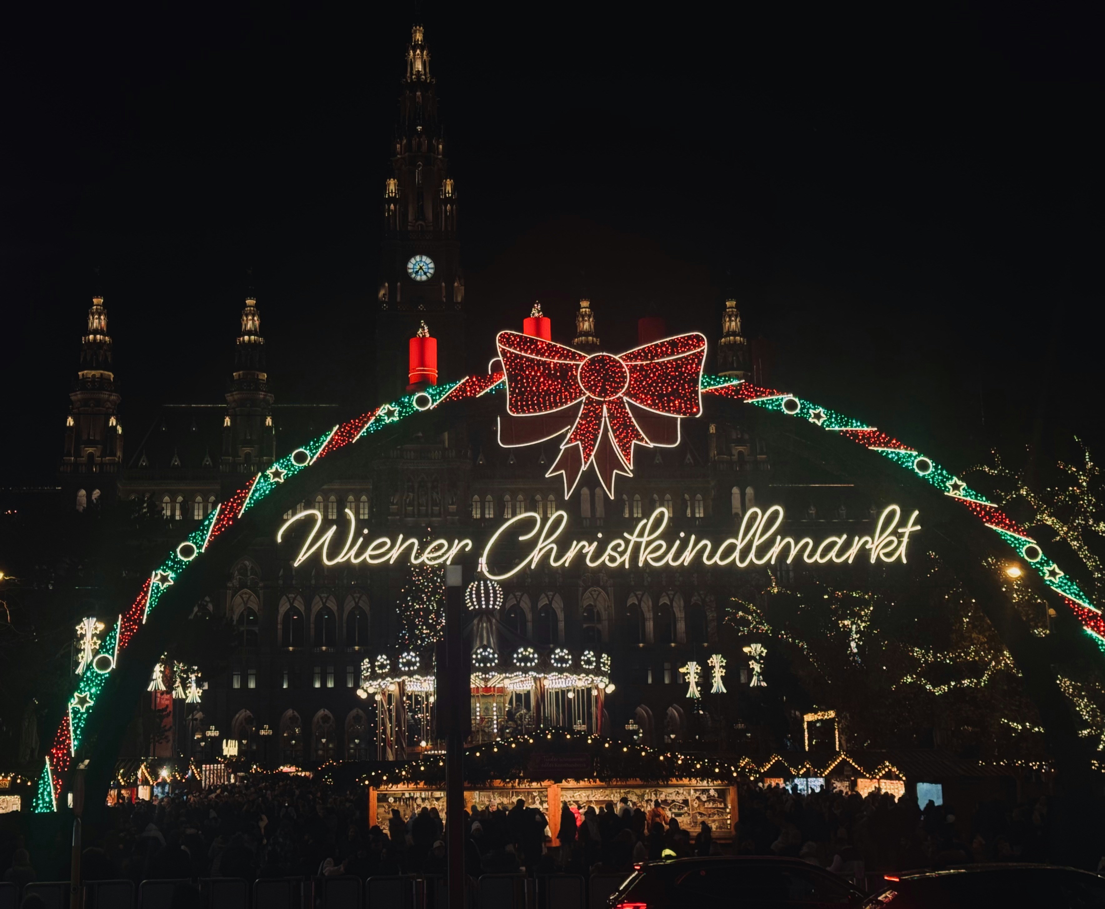 A christmas light display in front of a large building