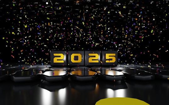 A black stage with yellow numbers and confetti