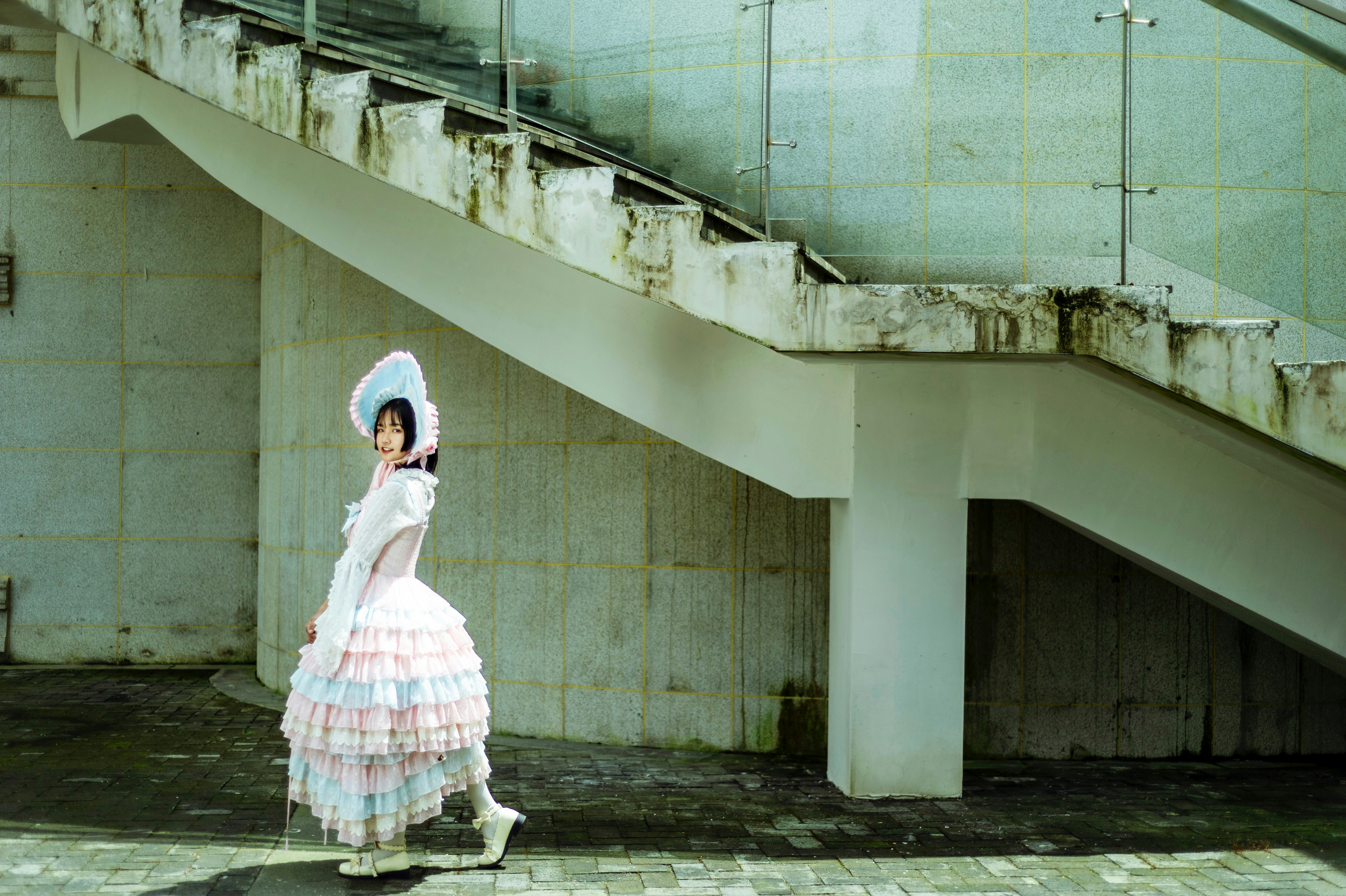 A woman in a dress is walking down the street photo – Free Dance Image ...