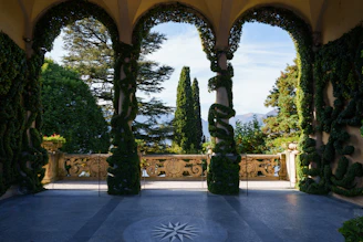 A view of a courtyard through an archway