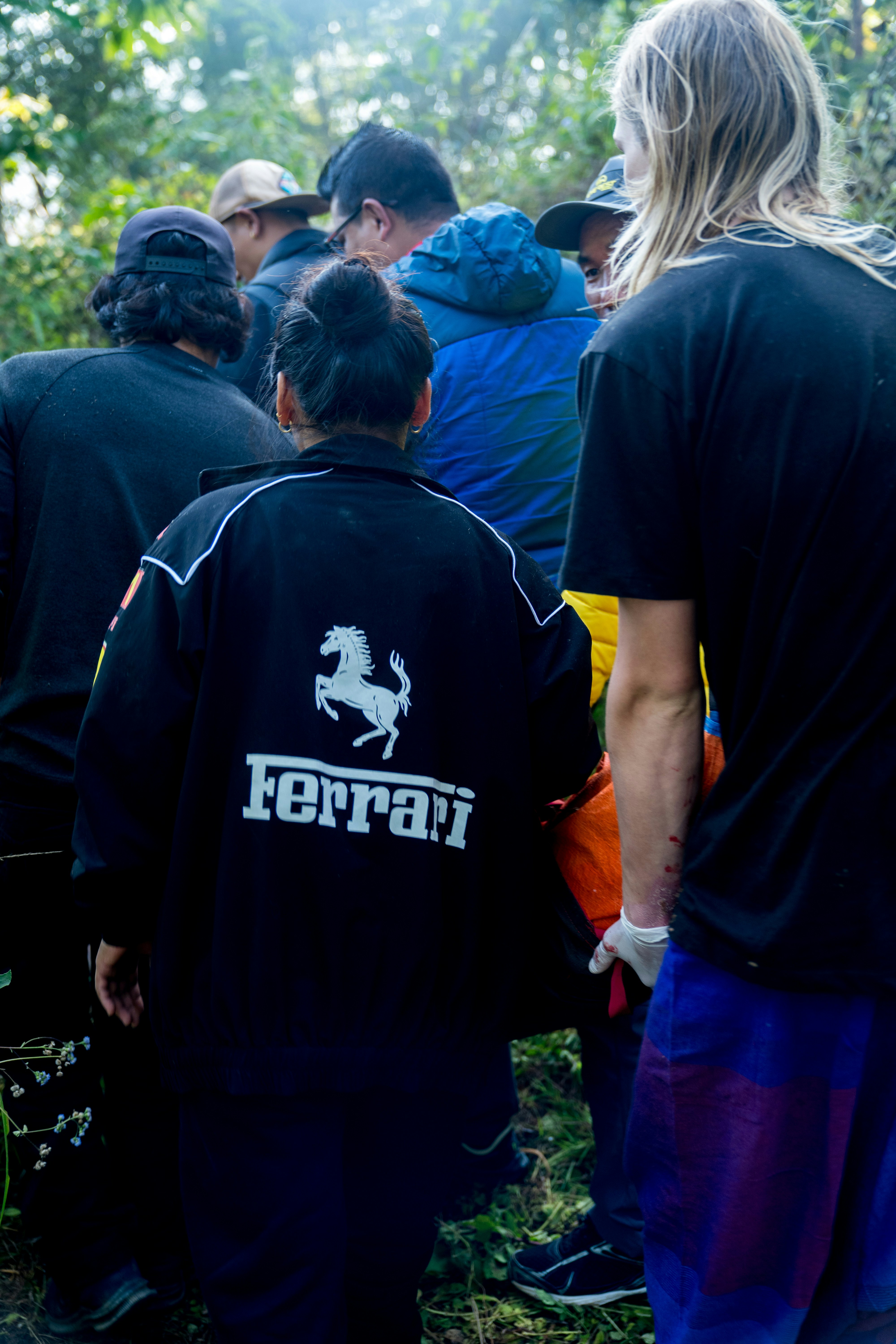 A group of people standing next to each other