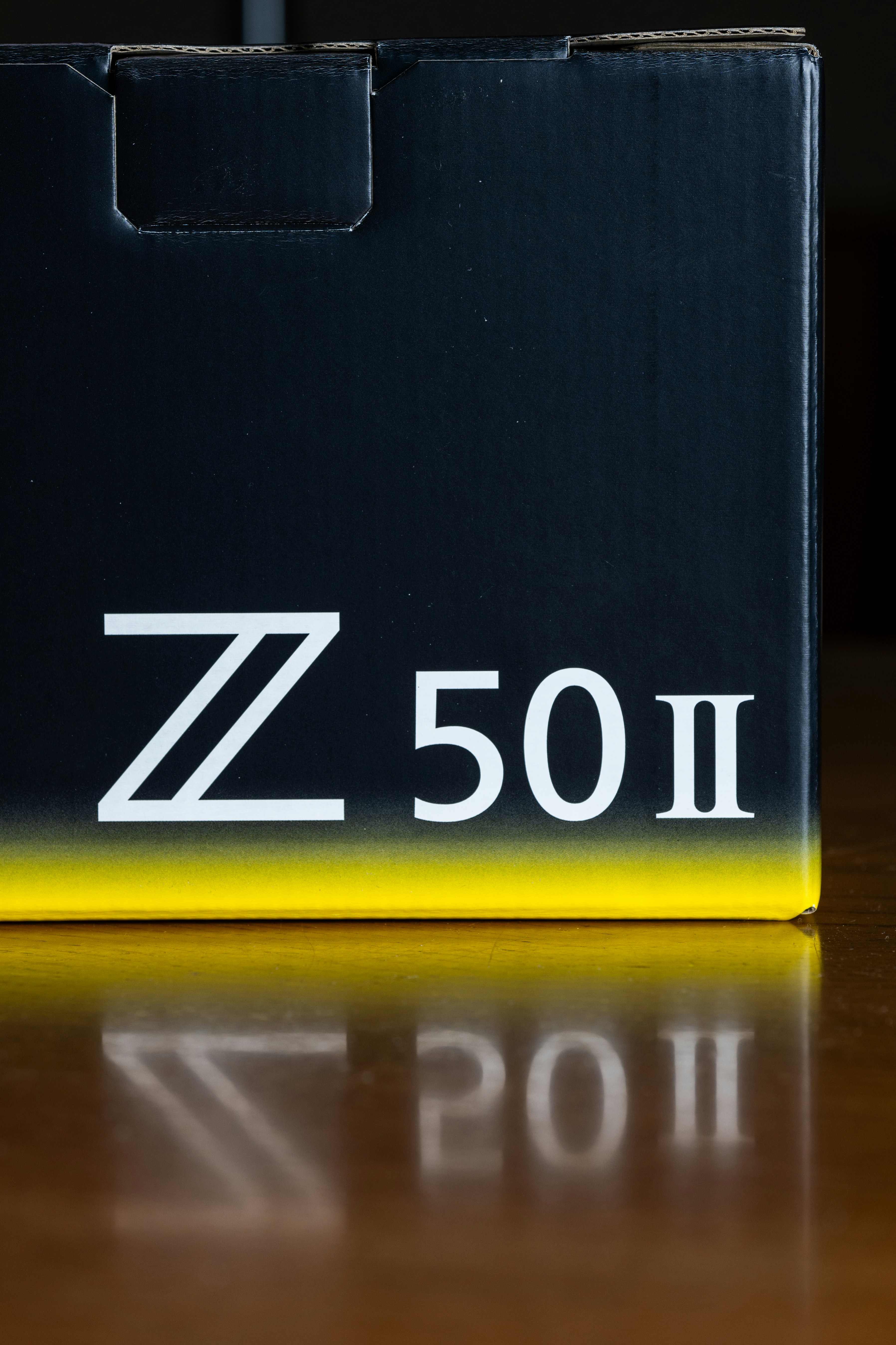 A black box with a yellow strip on top of it