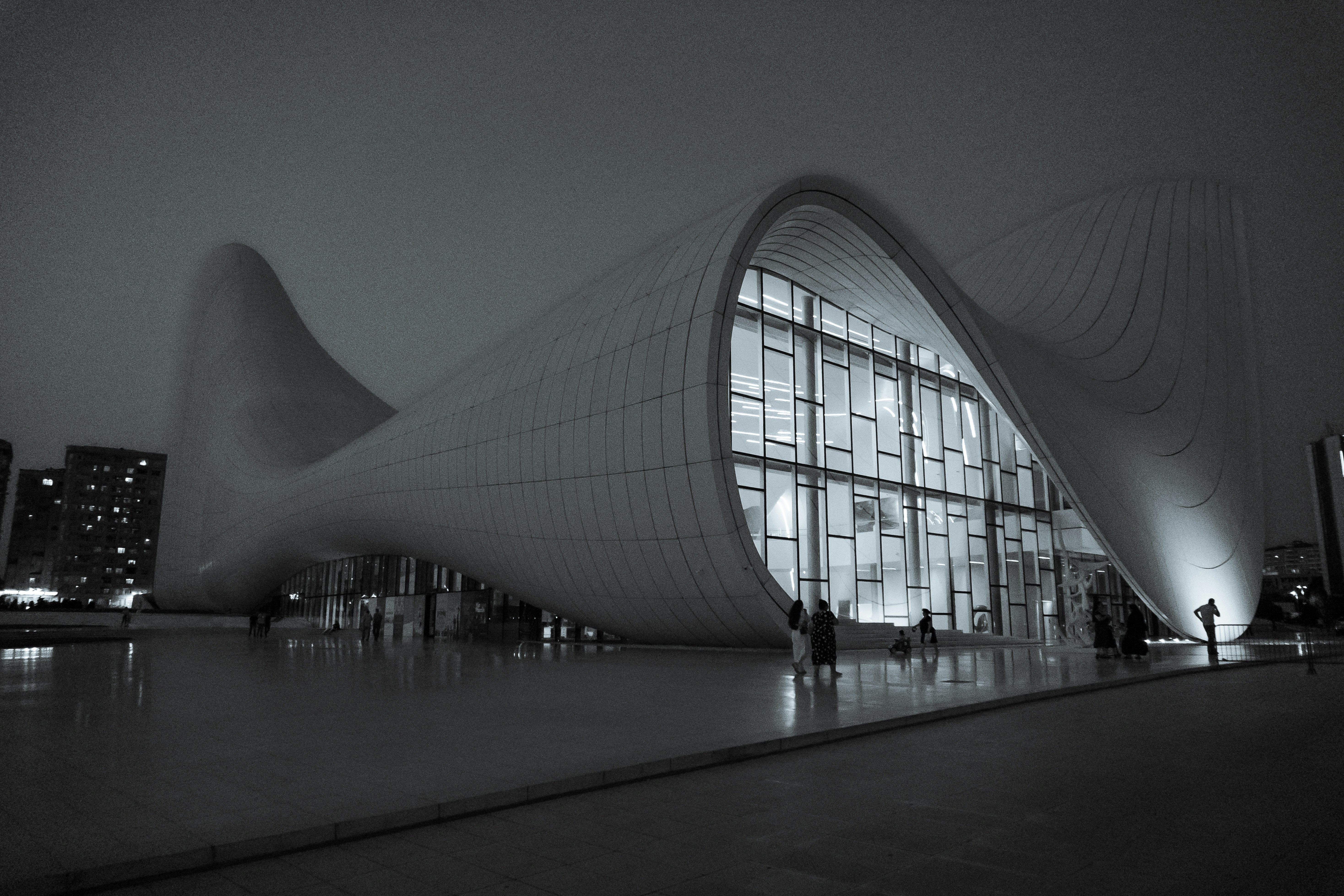 A black and white photo of a large building