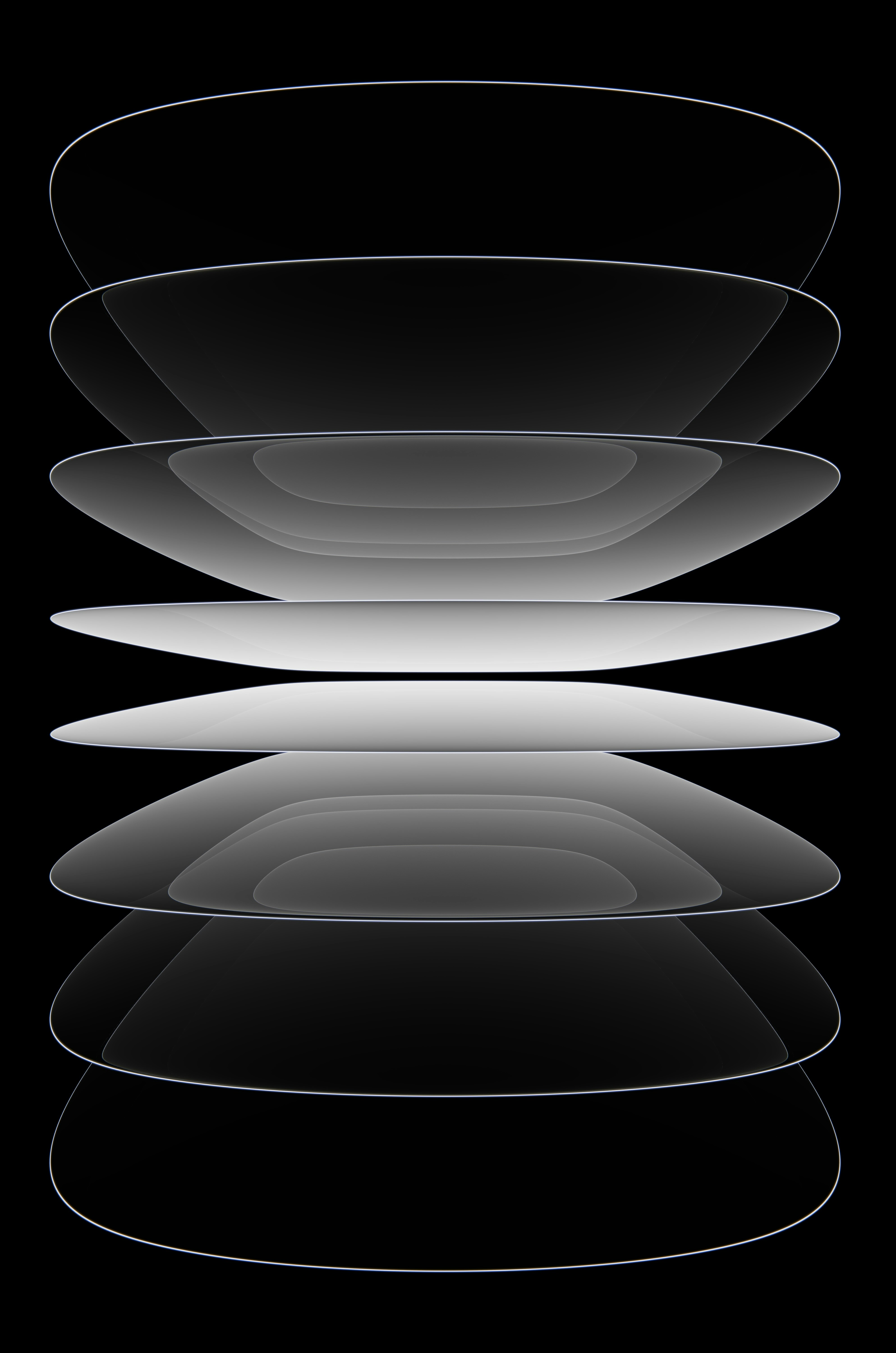 A black and white photo of a stack of plates