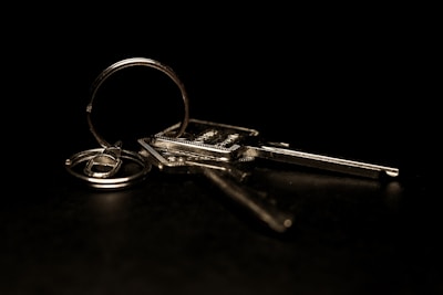 A pair of keys sitting on top of a table