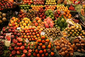 A large display of fruits and vegetables for sale