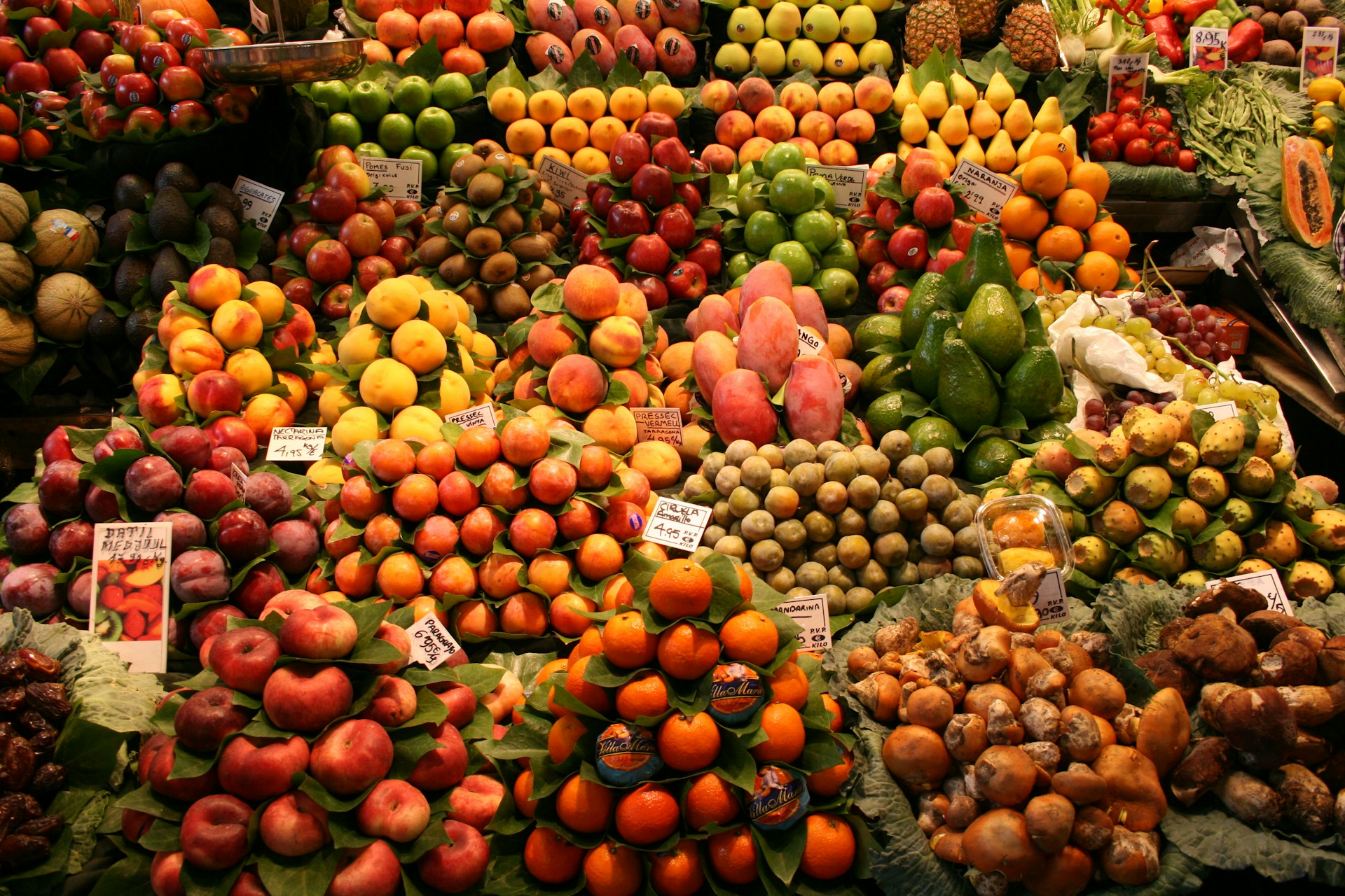 A large display of fruits and vegetables for sale
