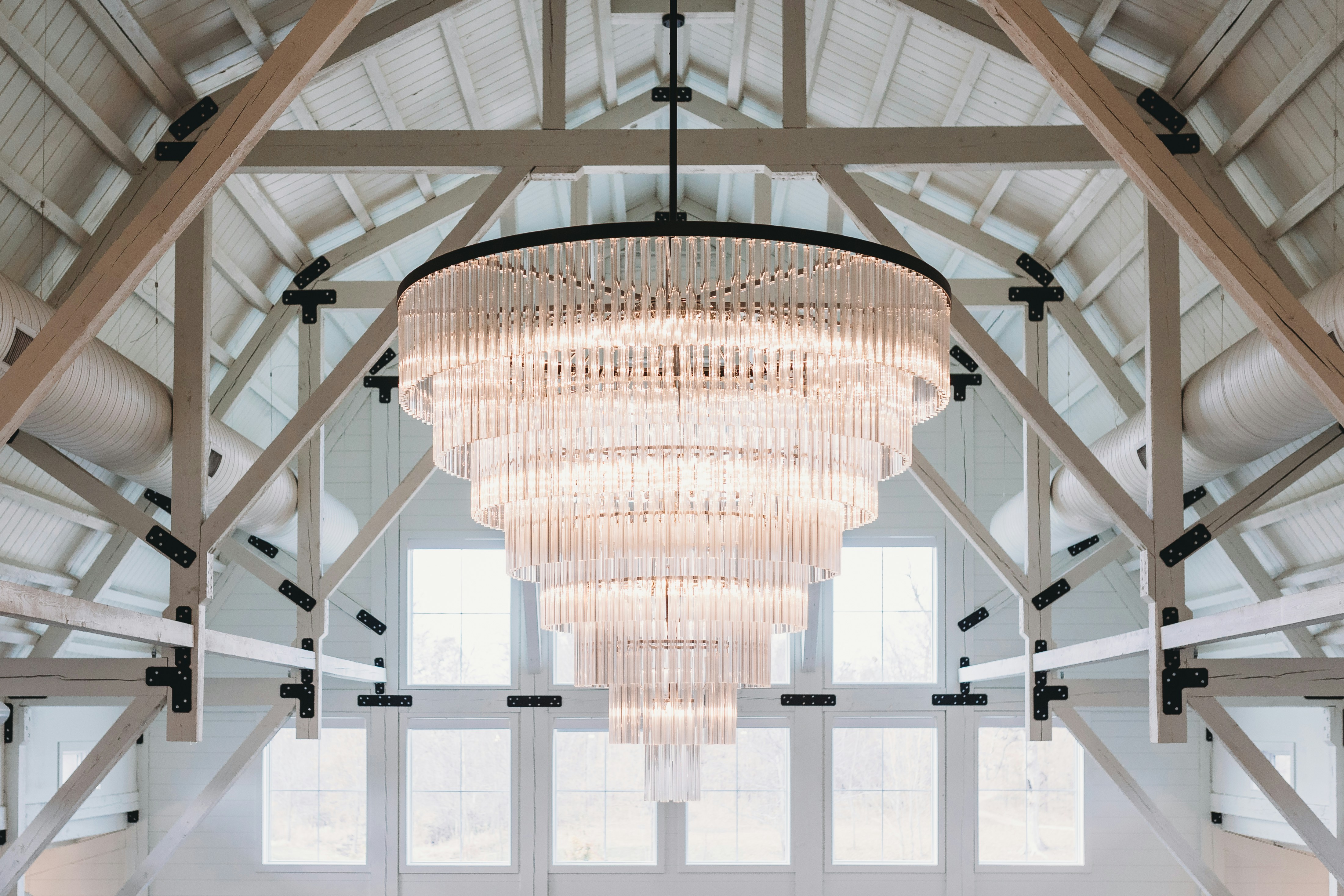 A large chandelier hanging from the ceiling of a building