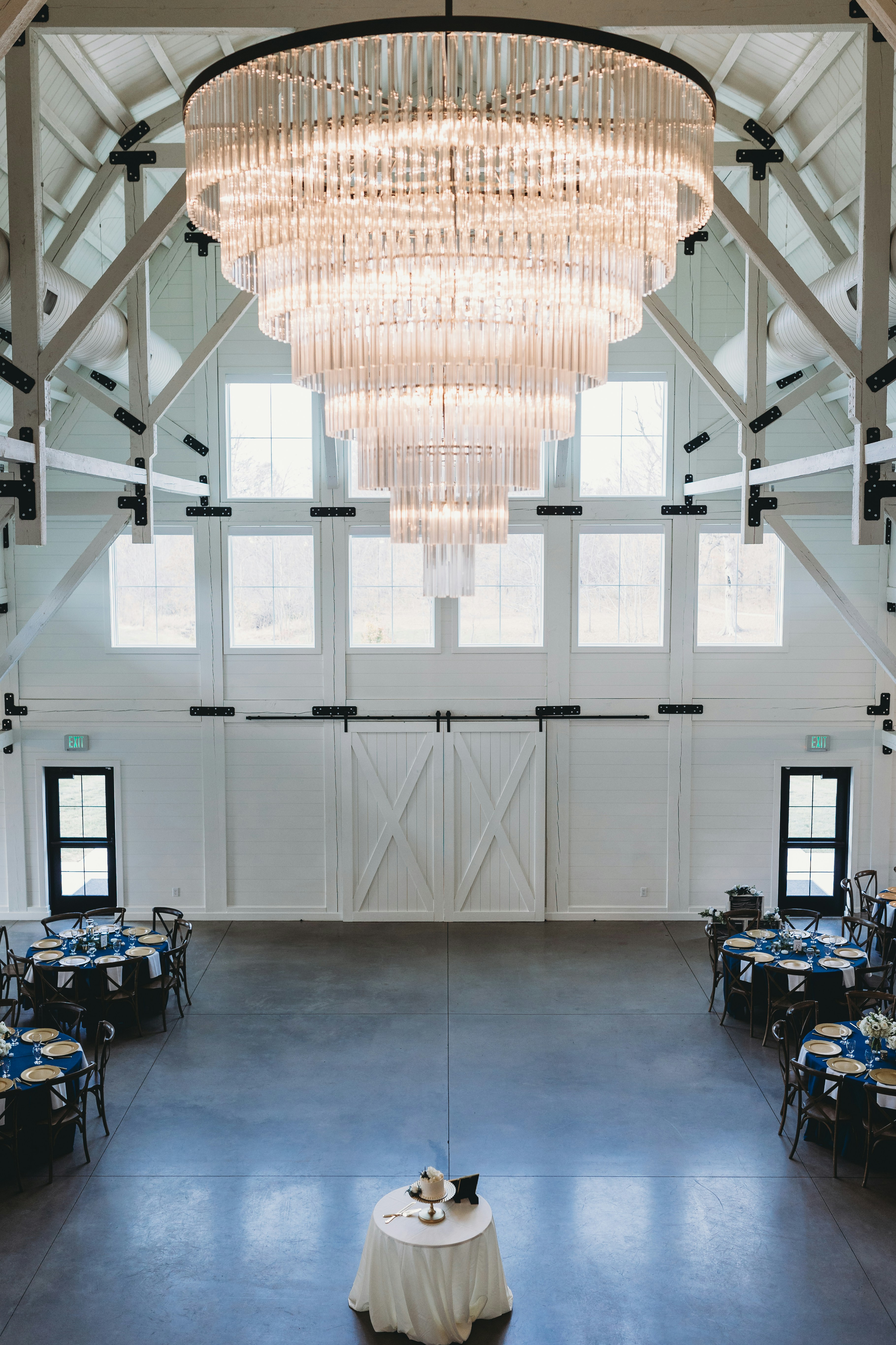 A large room with a chandelier hanging from the ceiling